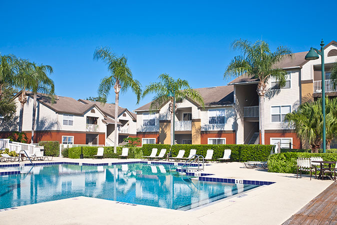 Pristine swimming pool on grounds of new condo complex.