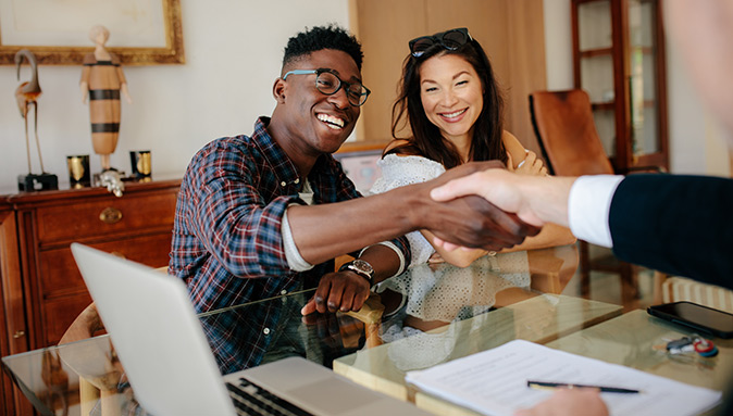 A happy couple who just closed on their home.