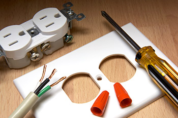 Outlet components and wires with a screwdriver