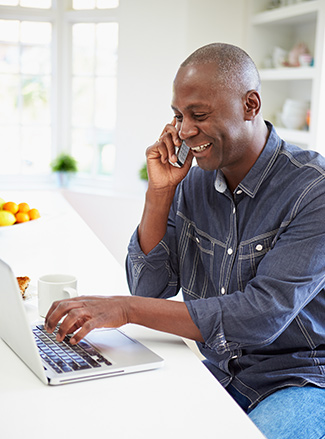 Homeowner renewing his home warranty coverage