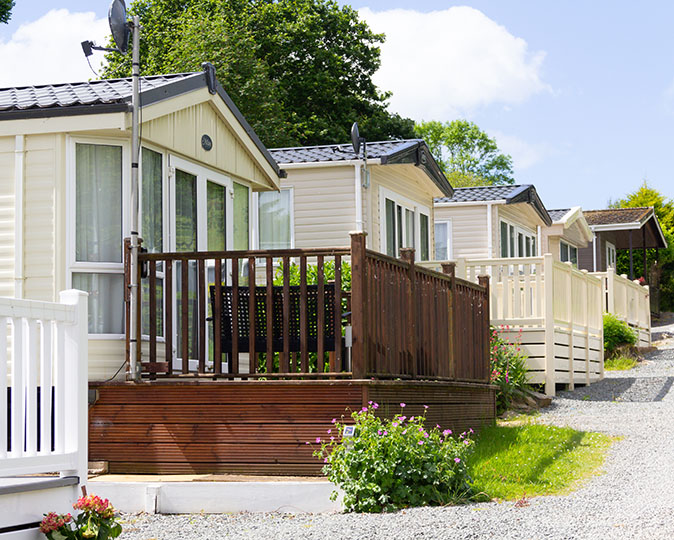 A row of manufactured homes in a mobile home community.