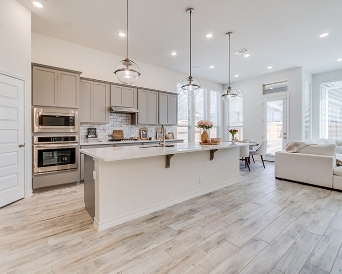 A bright, modern kitchen in a spec home.