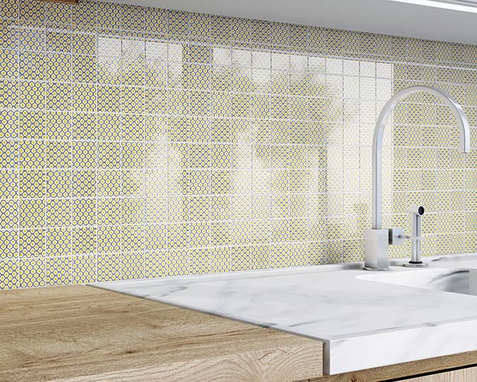Mosaic green and white backsplash with modern fixtures and decor
