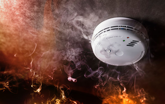 Smoke rises towards the ceiling smoke detector.