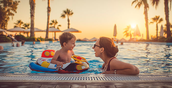 Mom and child enjoying pool