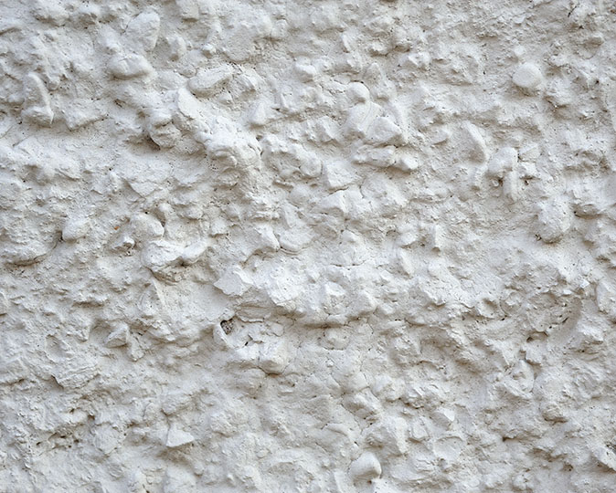 A closeup of a painted popcorn ceiling.