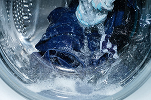 Top view of washing machine filling with water