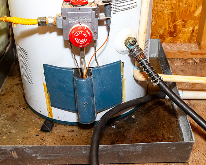 A hard water mineral deposit from inside a water heater tank.